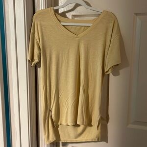 American Eagle yellow V-neck shirt
